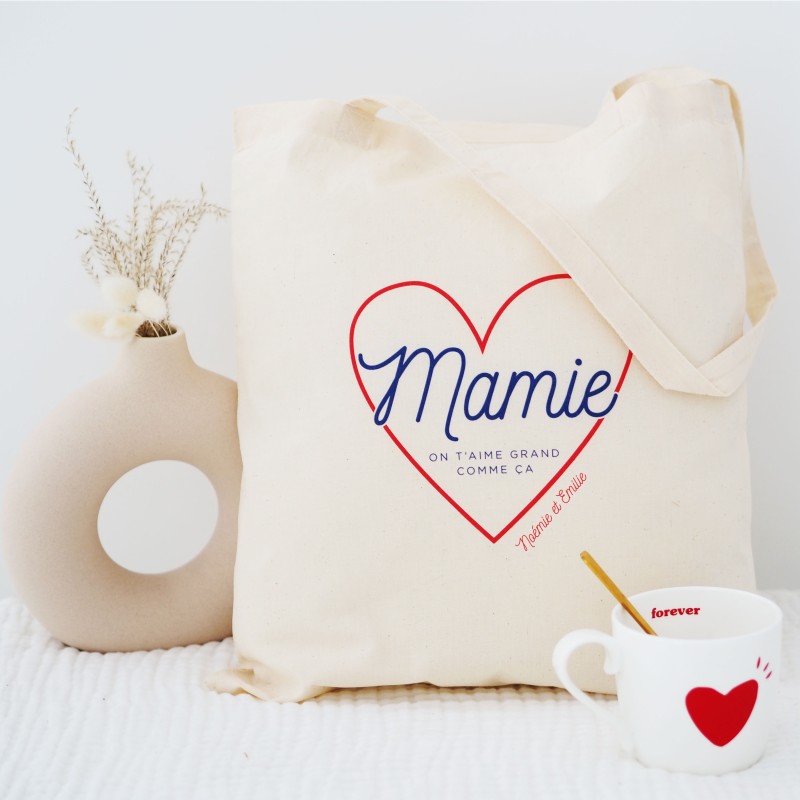 Tote bag Mamie On t'aime grand comme ça à personnaliser Tote bag Mamie On t'aime grand comme ça à personnaliser
